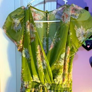Floral green romper with elastic waist